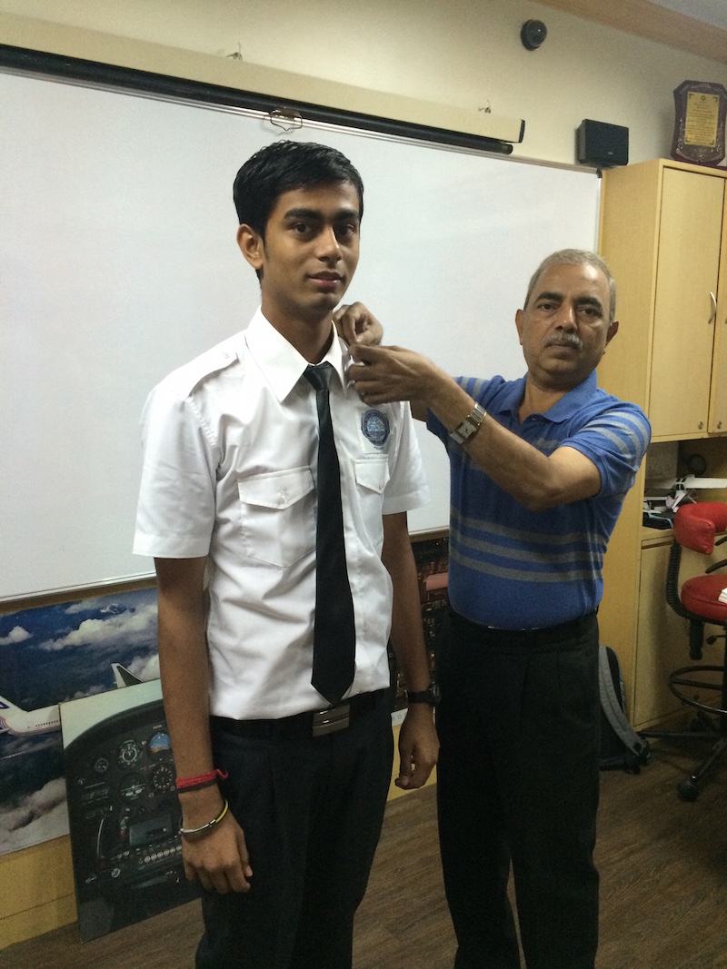 Cadet Yash Vyas - latest 2015 batch student felicitated by Capt A.D Manek with student Pilot appulets