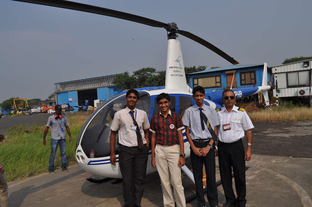Capt A.D Manek taking winners Brain Ninja Quiz Contest for a once in a lifetime joyride in a helicopter
                 December 2014